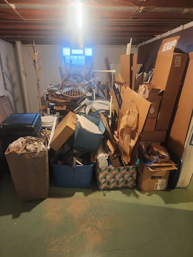 Roll-off dumpster container at job site for 2 Yard Dumpster Rental in Indian Harbour Beach